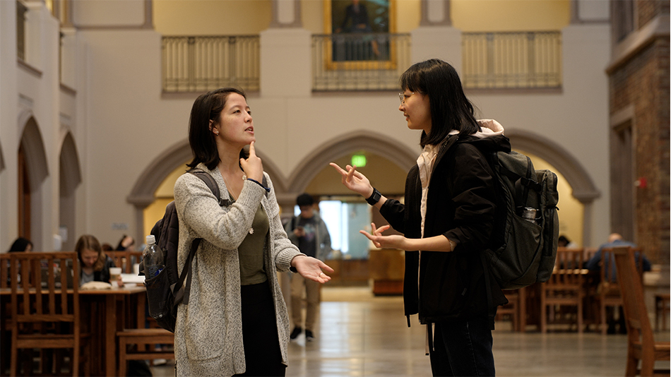 Students communicating using sign language