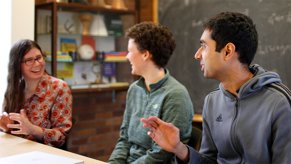 Students chat in the department’s lounge. Photo by Dorothée Brand.