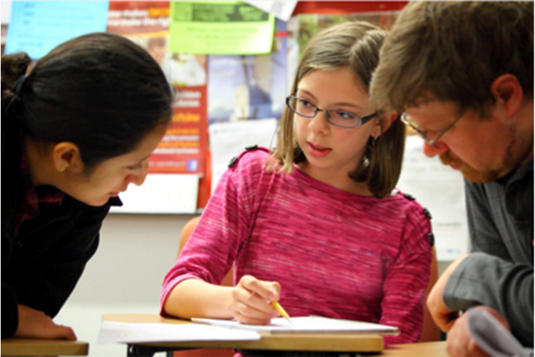 A UW Math Hour Olympiad participant discusses her solution. 