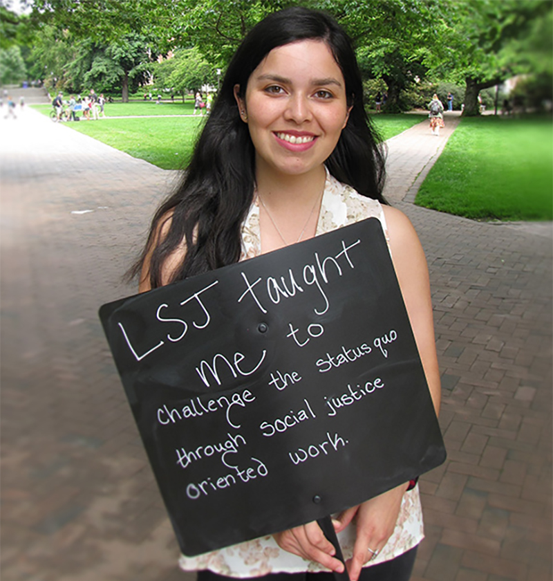 Student holding sign that begins, "LSJ taught me to..."