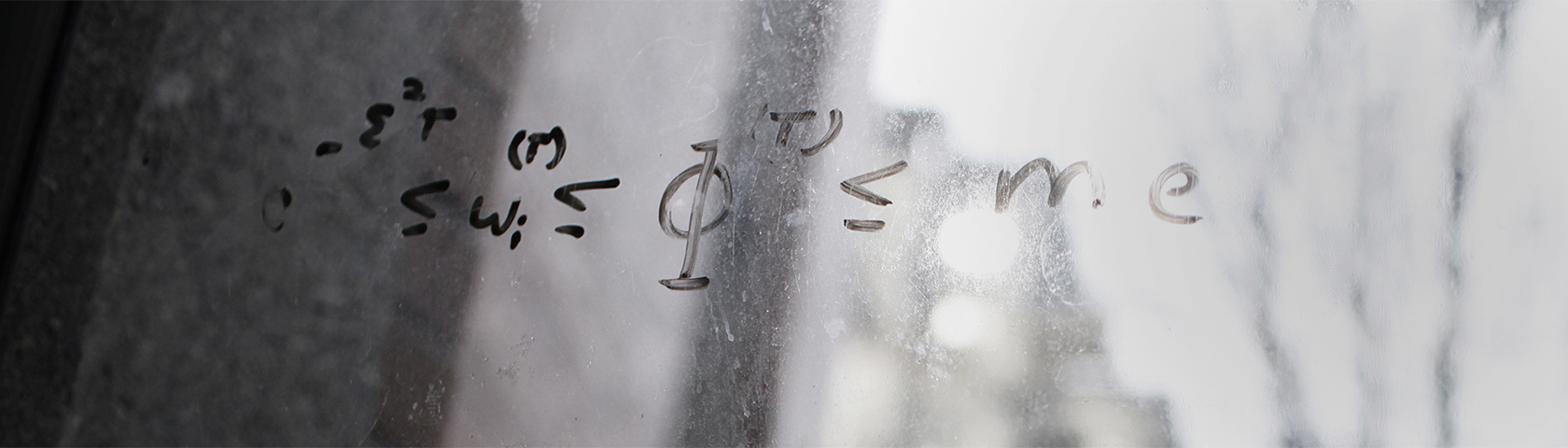 Mathematical formula written on glass.