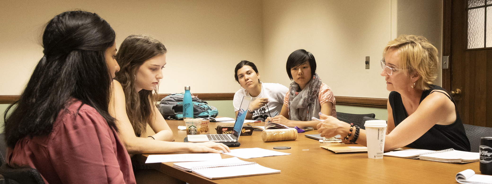 Student discussing around a table