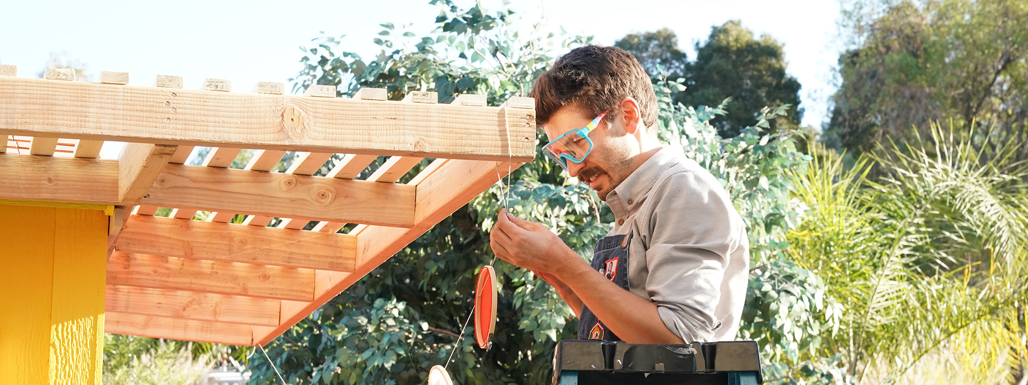 Adam Kingman working on a project during the show "Making It"