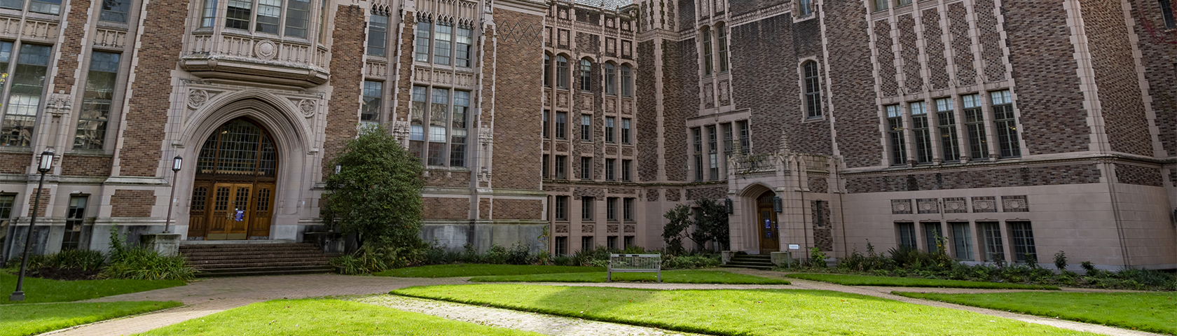 Front of UW brick building with grass 