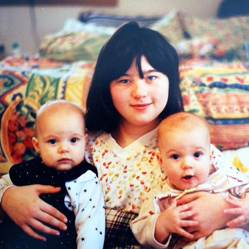 Young Leslie Jeanne Berns holding twins.