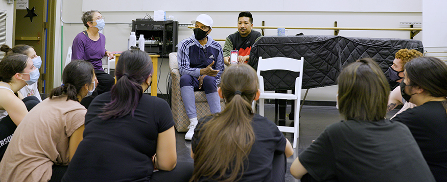 Ron Brown talking to dance students at the end of reheasal.