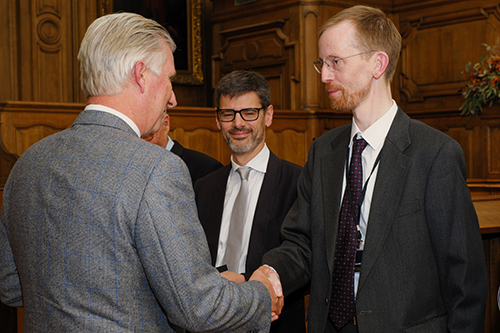 Thomas Richardson shaking hands with King Philippe of Belgium