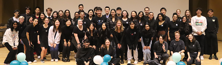 Group photo with dozens of Grey Matters team members