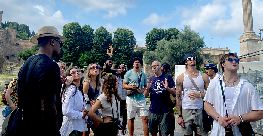 Professor Jim Clauss talking with students at the Roman Forum.