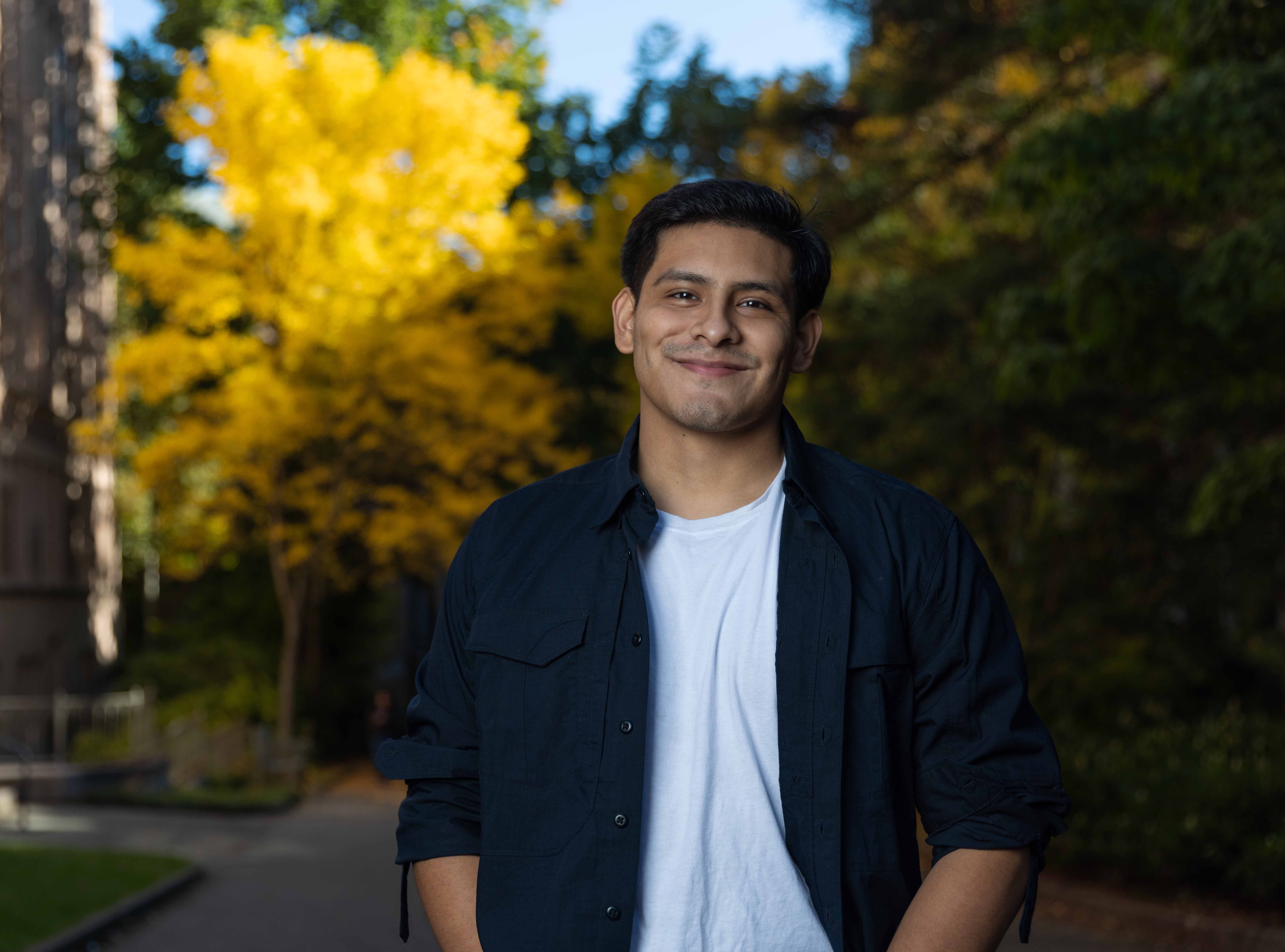 Pedro Caballero standing on UW campus