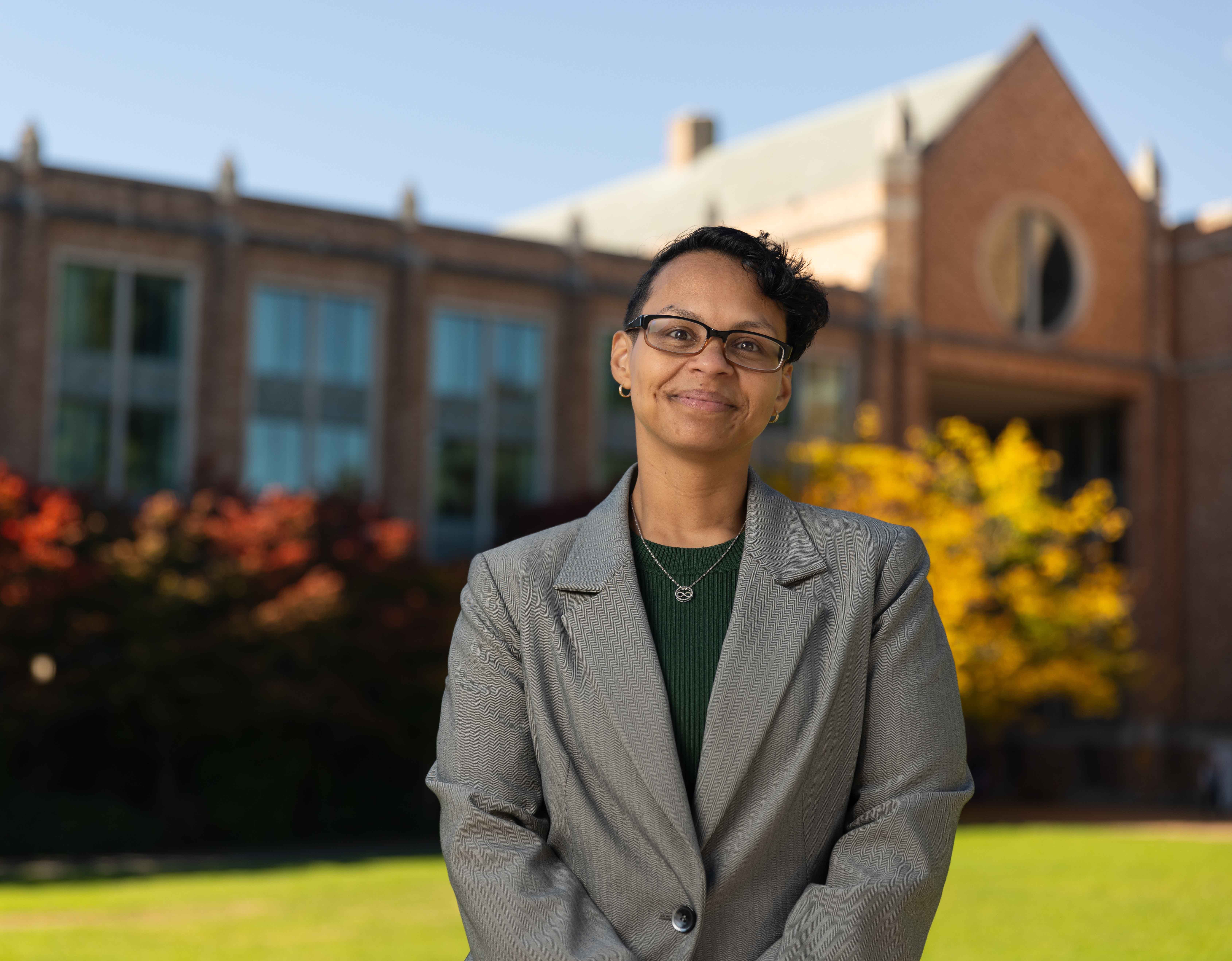 MJ Mencias standing in front of Allen Library