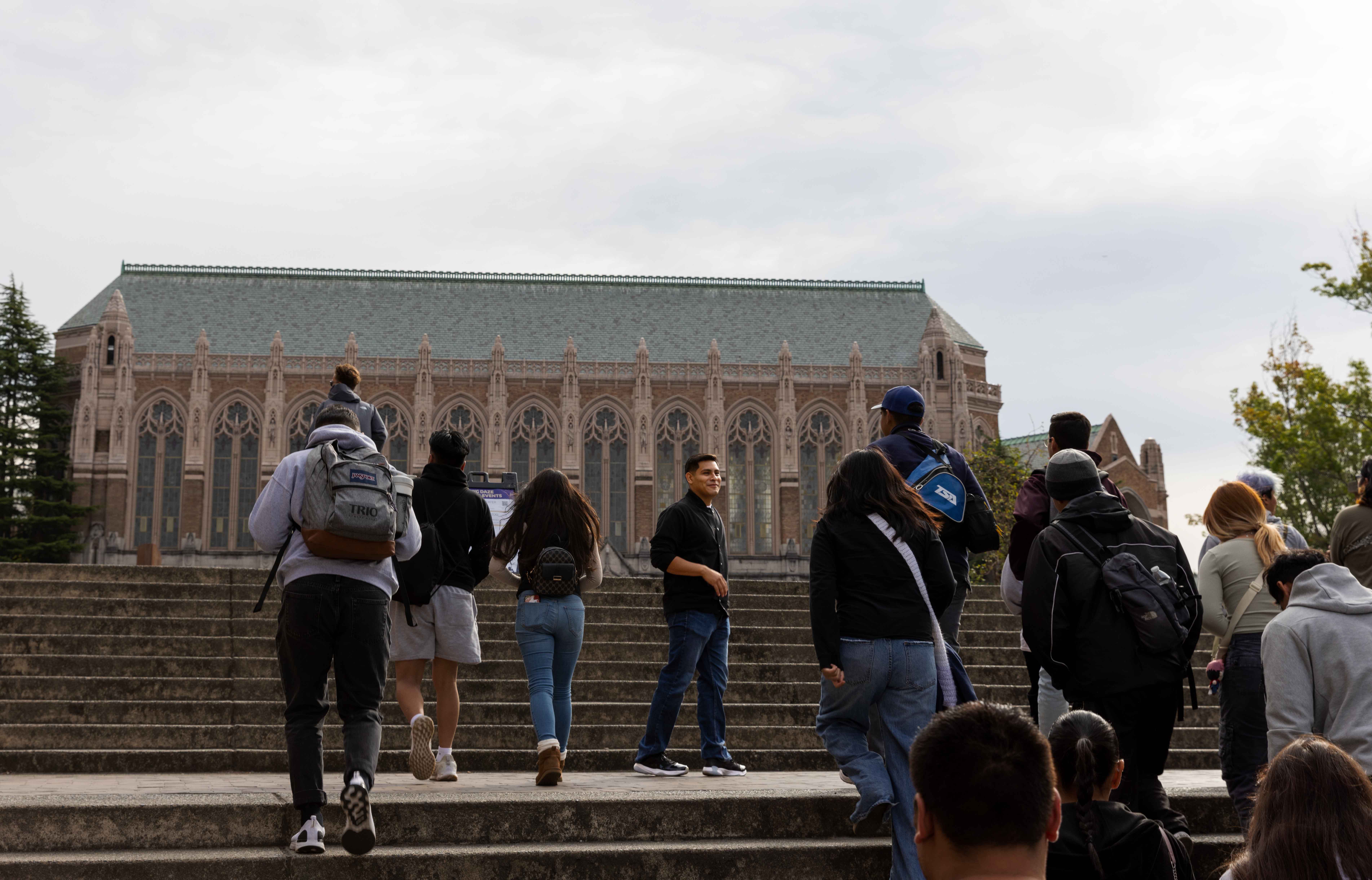 Pedro Caballero leading tour on campus