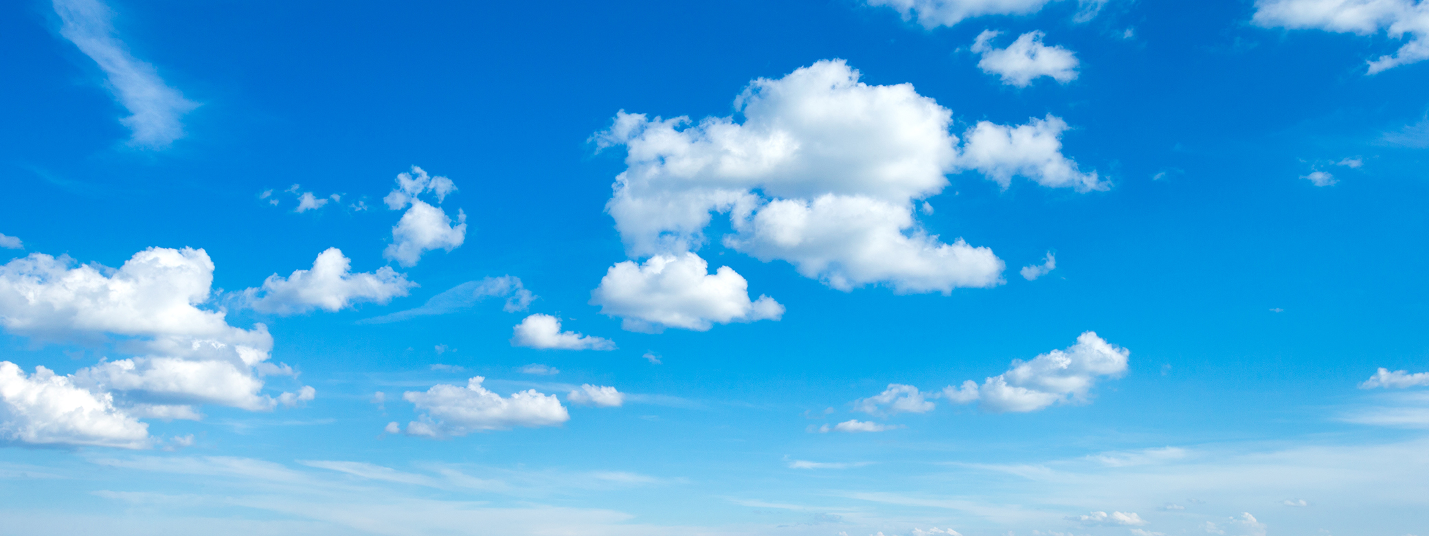 Blue sky with a few white clouds