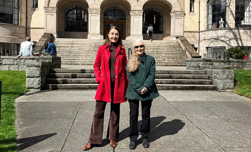 Professors Gordana Crnkovic and Naomi Sokoloff on the UW campus with Denny Hall behind them. 