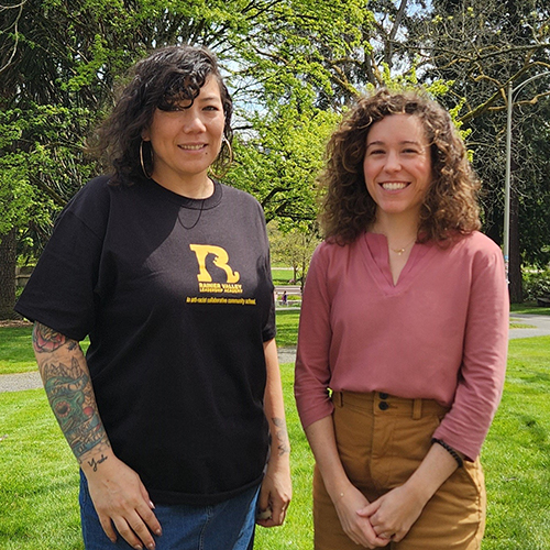 Taiko Aoki-Marcial and Cristina Sanchez-Martin standing with greenery behind them. 