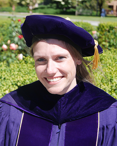 headshot of Liesbeth Gijbels in cap and gown