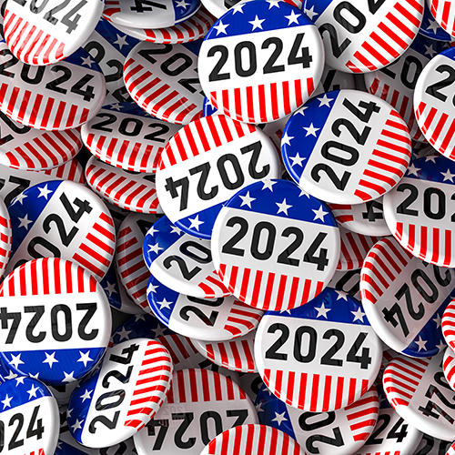 Red, white & blue election buttons with "2024" on them. 